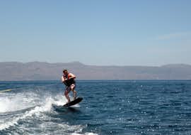 Wakeboarding Lessons in Agia Marina near Chania from Cactus Water Sports Center Agia Marina A person is participating to Wakeboarding Lesson in Agia Marina with Cactus Water Sports Center.