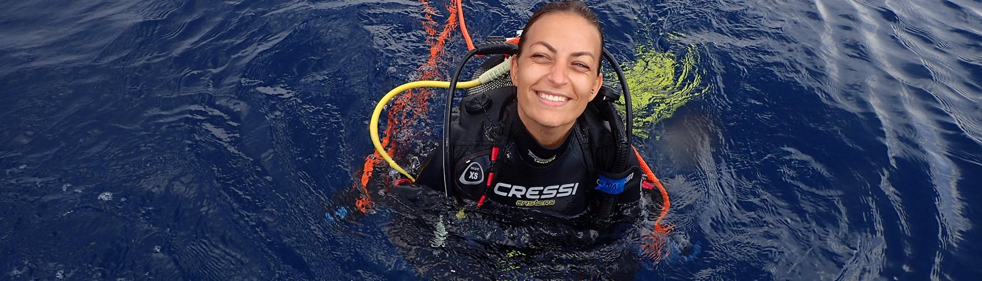 Diver smiling during her PADI Advanced Open Water Diver in Santorini.
