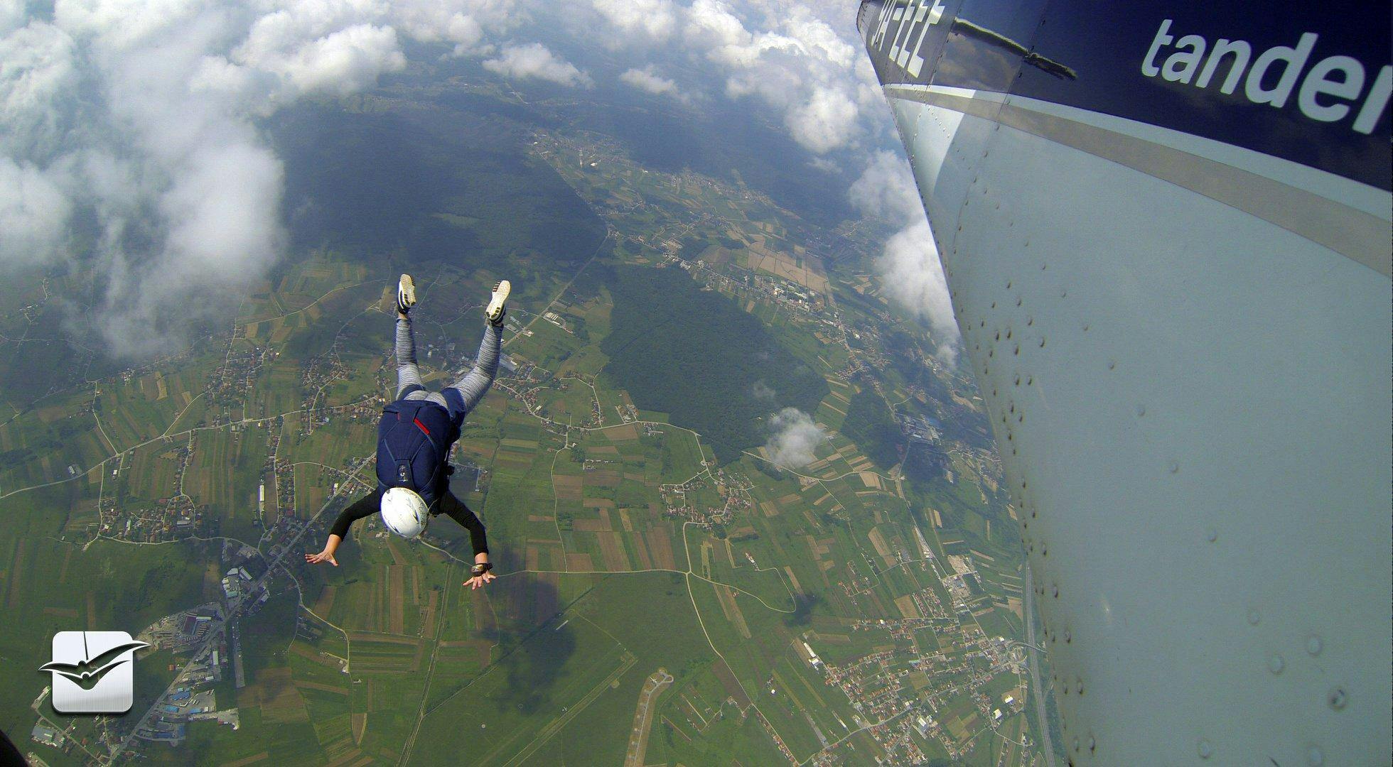 Two people are skydiving during their Tandem Skydive in Zagreb from 3000m with Skydiving Tandem Group Croatia.