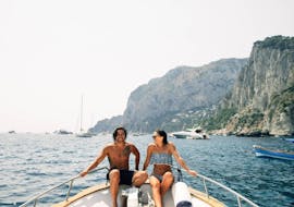 Two participants are happy to take part in the Small Group Boat Trip from Sorrento to Capri.