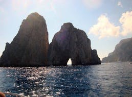 View of sea stacks of Capri from the sea during Boat Trip from Sorrento to Capri with Capitano Ago