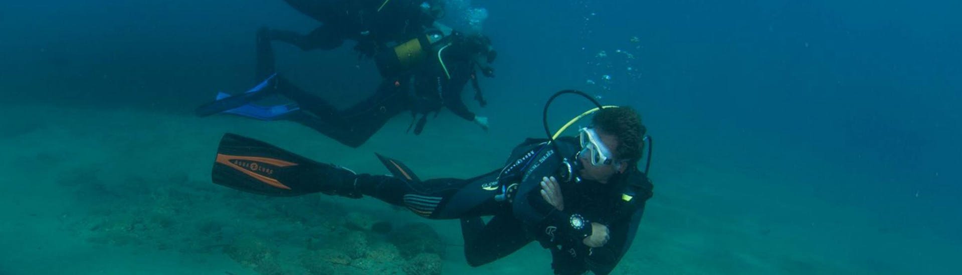A diver exploring the waters of northern Crete with Guided Boat Dives in Northern Crete for Certified Divers