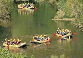 Rafting on the Río Segura in Cañón de Almadenes & its Caves from Cañón y Cañón Multiaventura Murcia The participants paddle over the calm river Rio Segura during the rafting to Cañon de almadenas together with Cañon y Cañón Multiaventura.