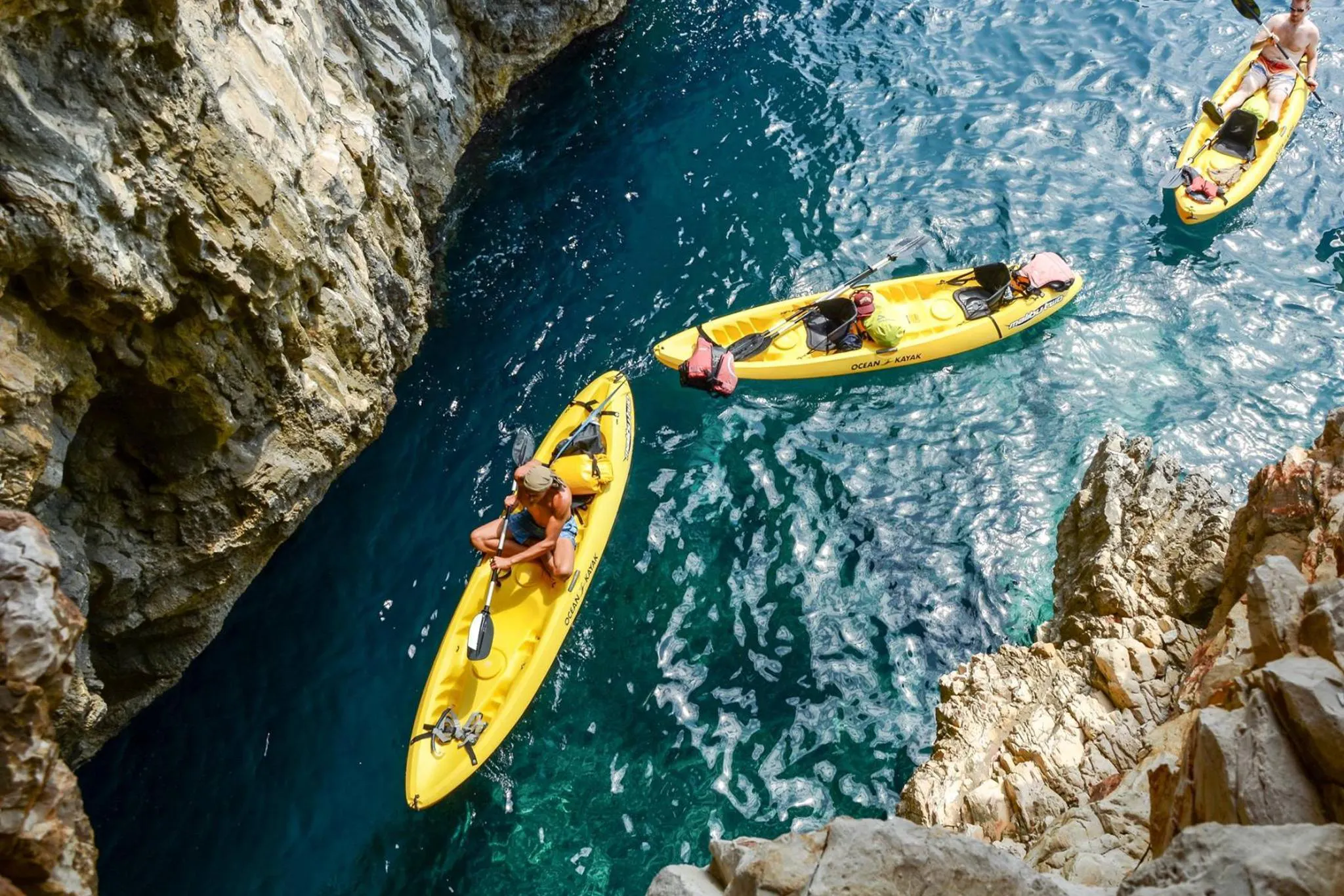 Sea Kayaking at Dugi Otok - Half Day Tour with Kayak & Bike Adventure Zadar Two kayaks viewed from above during the Sea Kayaking at Dugi Otok - Half Day Tour with Kayak & Bike Adventure Zadar.