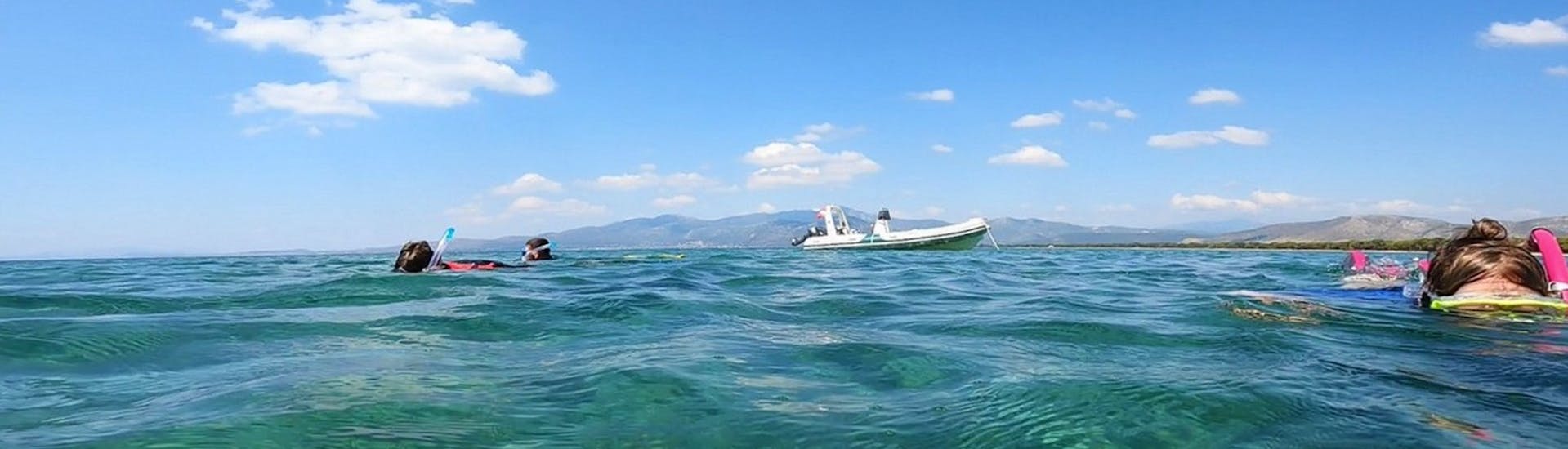 Boat on the water during the snorkeling near Athens - Nea Makri hosted by Kanelakis Diving Experiences.