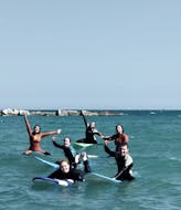 Gente en el mar durante una Clase Privada de Surf (desde 6 años) en Barcelona con Moloka'i SUP Center Barceloneta.