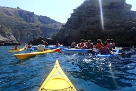 Gathering of Kayaks during the Sea Kayak Tour to the Crapolla Fjord with Marea Outdoors Nerano.
