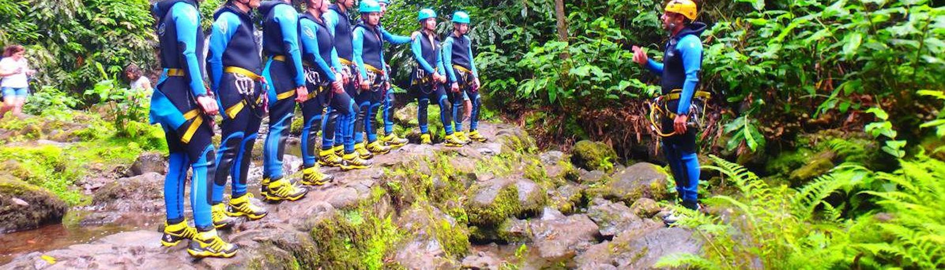 Our guide is explaining the go-to rules and behaviors for the Canyoning in Ribeira dos Caldeirões with Lunch - Full Day.