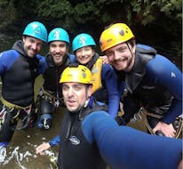 Some participants smiling at the camera during the Canyoning in Ribeira dos Caldeirões - Half Day with  Picos de Aventura Azores.