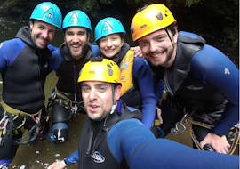 Some participants smiling at the camera during the Canyoning in Ribeira dos Caldeirões - Half Day with  Picos de Aventura Azores.