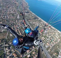 Instructor and passenger during the Tandem Paragliding in Altavilla Milicia (Palermo) - Classic with Sicily Paragliding.