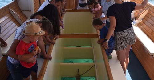 Morning Boat Trip in a Glass-Bottom Boat to Verudela Rio Boat Pula Picture of the boat on the water during the morning Boat Trip in a Glass-Bottom Boat to Verudela with Rio Boat Pula.