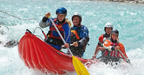 Adventurous Canoe Rafting on the Lech River with Outdoorzentrum Allgäu. A couple of boats in the water during Adventurous Canoe Rafting on the Lech River with Outdoorzentrum Allgäu.