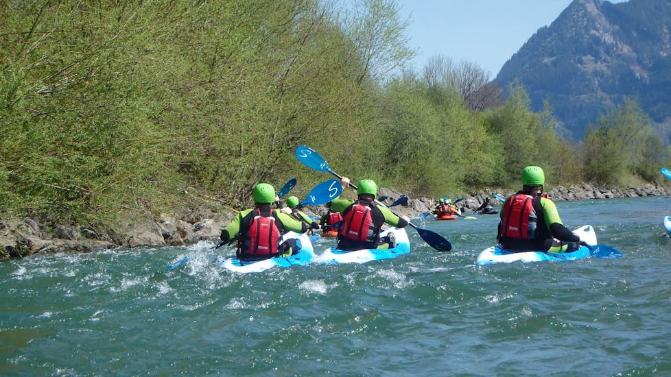 A couple of boats in the water during the Sit-on-Top Kayak Tour on the Iller River with Outdoorzentrum Allgäu.
