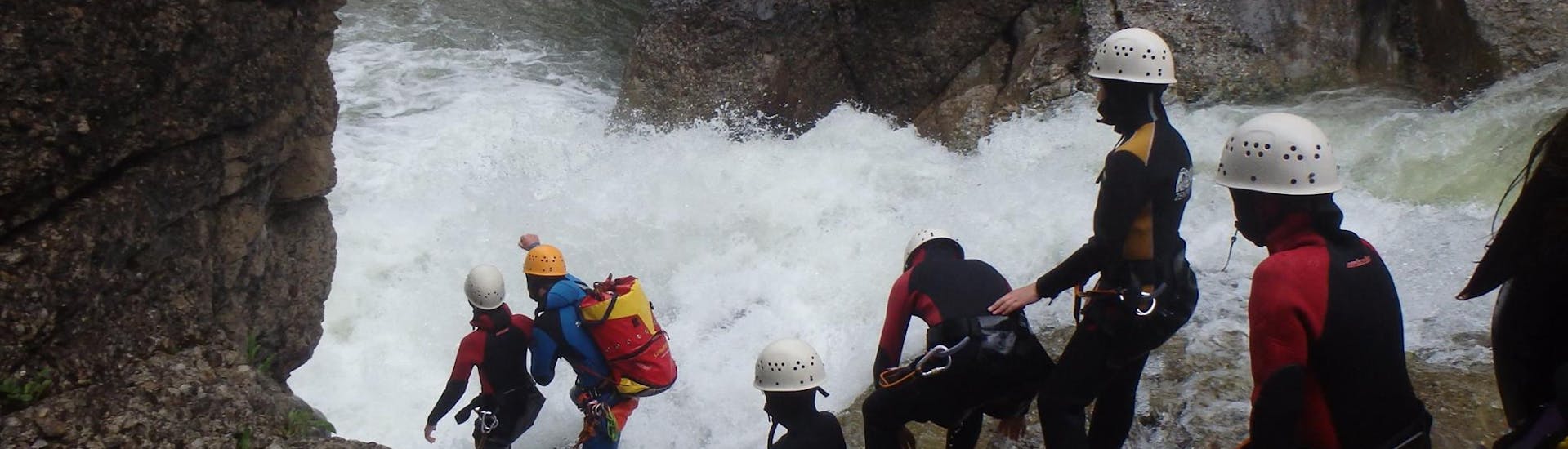A group jumping in the water during Advanced Canyoning in Allgäu with Outdoorzentrum Allgäu.