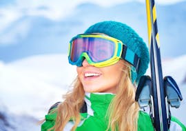 A skier smiling during Private Ski Lessons for Adults of All Levels from Gebhard Kneisl.