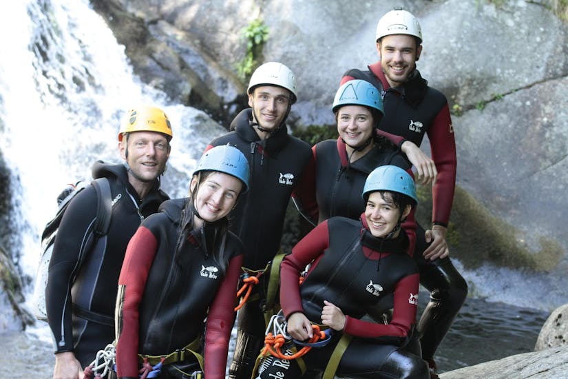 A group of canyoning enthusiasts is taking a picture after completing their Canyoning "Discovery Day" - Canyon de la Haute Borne with Les Intraterrestres.