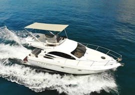 Photo of the beautiful boat that will take you to explore the coast of Marbella during the private boat tour with swimming stop with Marbella Charter.. 