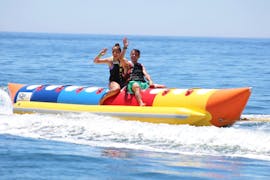 Picture of people riding the banana boat near Albufeira with Nautifun Galé Albufeira.