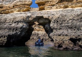 People visiting a cave during a Boat Trip to Ponta Da Piedade from Lagos with BlueFleet Lagos.