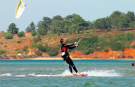A participant is learning how to kitesurf with the Kitesurfing Lessons for Kids & Adults - All Levels with KiteSchool.pt Lagos.