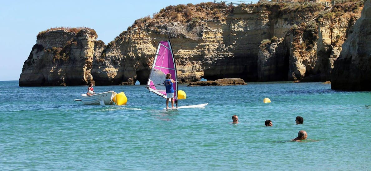 A guy is having fun during the Private Windsurfing Lessons for Kids & Adults - All Levels.