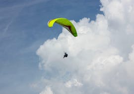 A participant enjoying a thermic tandem paragliding experience over the Sava Hills during a tandem paragliding activity with Sky Riders Paragliding Croatia.