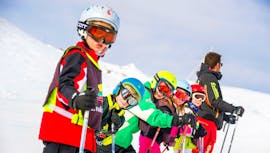 Kids are getting ready for their Kids Ski Lessons (5-12 y.) for All Levels with Evolution 2 Peisey Vallandry.