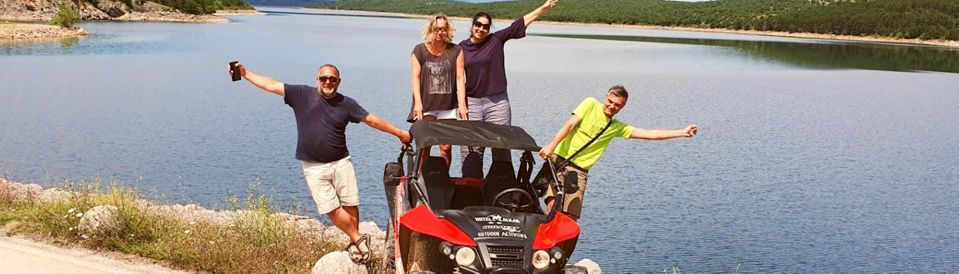 Happy participants of the Fun Buggy Tour from Sinj are posing for a photo taken by a local guide from Hotel Alkar.