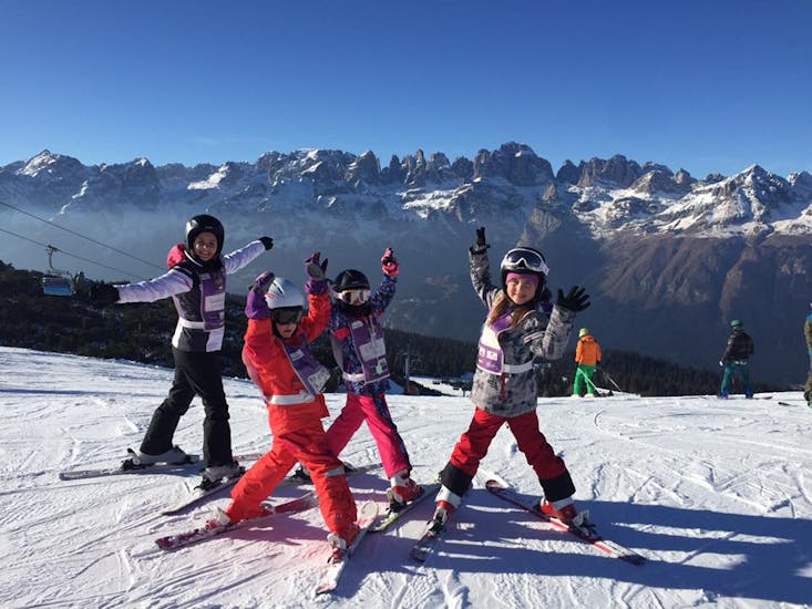 Kids and mountains in Andalo during one of the Kids Ski Lessons "Elite" (6-14 y.) for Advanced Skiers.
