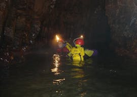Participants in an activity of speleo canyoning in the Cueva de Nacimiento provided by Rana Sella Arriondas.