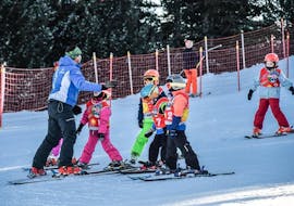 Lezioni di sci per bambini (6-12 anni) per principianti assoluti con Scuola Sci Cermis Cavalese.