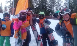Lezioni di snowboard per bambini (6-15 anni) con esperienza - Max 5 - Crans con Swiss Mountain Sports Crans-Montana.