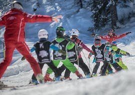 Ski instructor with kids at Speikboden - Campo Tures - Sand in Taufers fo one of the Kids Ski Lessons for all levels. 