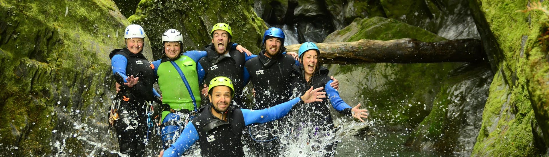 Group of adventurers having fun at Canyoning from Wanaka at Mount Aspiring - Full Day with Canyoning New Zealand.