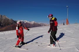 È il momento di una delle lezioni private di sci per adulti di tutti i livelli a Monte Pora.