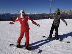 First day of the private snowboarding lessons for kids and adults in Monte Pora.