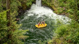 The participants of Rafting on Kaituna River - Winter are celebrating that they just mastered the plunge over Tutea Falls, the world's highest commercially rafted waterfall, together with their professional guides from Rotorua Rafting.