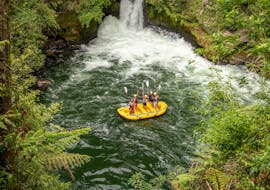 The participants of Rafting on Kaituna River - Winter are celebrating that they just mastered the plunge over Tutea Falls, the world's highest commercially rafted waterfall, together with their professional guides from Rotorua Rafting.