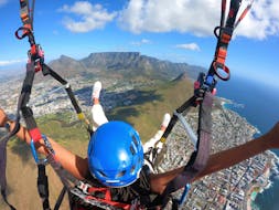 A person enjoys their Paragliding in Cape Town from Signal Hill or Lion's Head with Hi5 Tandem Paragliding Cape Town