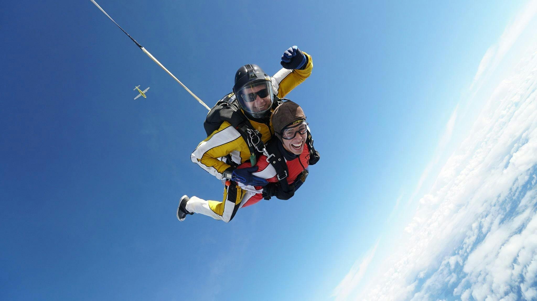 Tandem master with a skydiver are freefalling during Tandem Skydive in Taupo - 18,000 ft organized by Taupo Tandem Skydiving