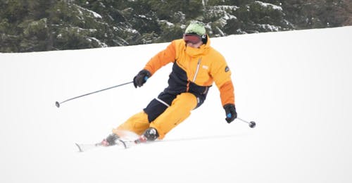 private-ski-lessons-for-adults-all-levels-snowmonkey-cover During the Private Ski Lessons for Adults - All Levels, a skier is gaining new skills under the guidance of an experienced ski instructor from the ski school SnowMonkey in Špindlerův Mlýn.
