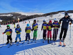 Kids Ski Lessons (5-12 y.) for Intermediate Skiers from Moonshot Ski School La Bresse.