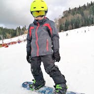Snowboardlessen (vanaf 8 j.) voor alle niveaus met Moonshot Ski School La Bresse.
