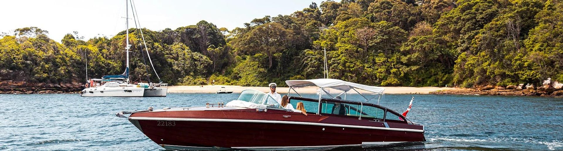 During the Private Luxury Boat Cruise in Sydney to Hidden National Park, tourists are relaxing aboard of hybrid electric vessel from Sydney Luxury Cruise.