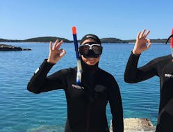 One of our guests ready to go snorkelling during the Snorkeling in Hvar with Aqualis Dive Center