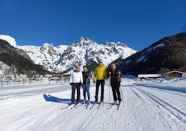 Quatre participants aux Cours de ski de fond particuliers pour tous les niveaux avec Wolfgang Pfeifhofer Ski-Mountain Coaching.