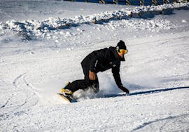 Lezioni private di Snowboard per tutti i livelli con École de ski Evolution 2 Super Besse.