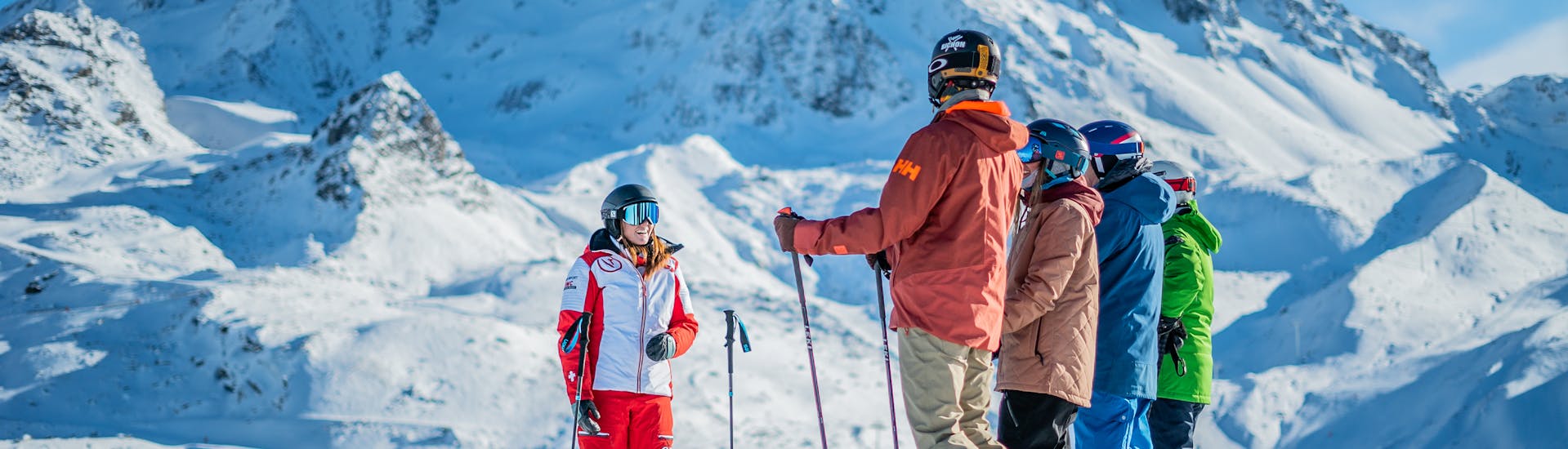 Skiers getting ready for their teens and adults ski lessons with the ESF Val Thorens. 