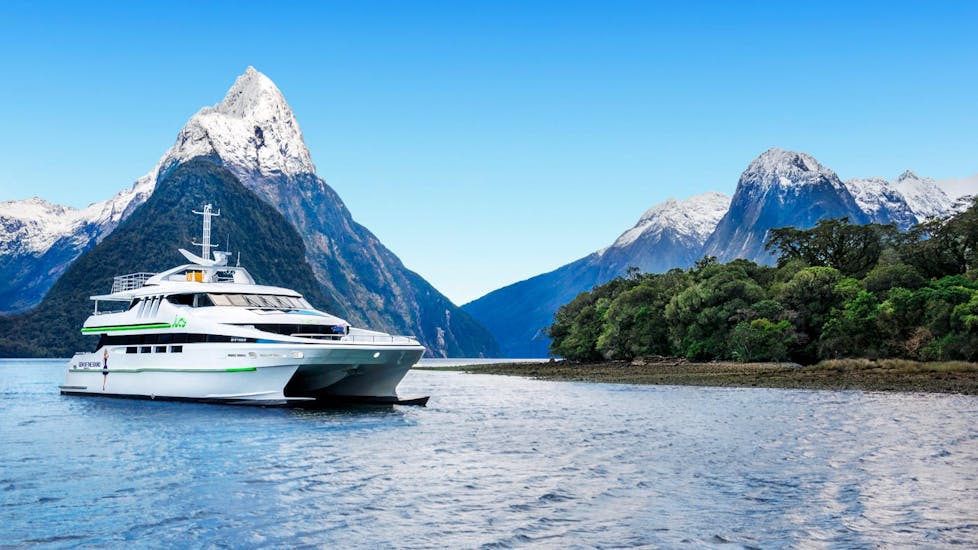 A beautiful view on a luxurious catamaran from Jucy Cruise leaving for the Milford Sound Cruise "Premium" - Winter.